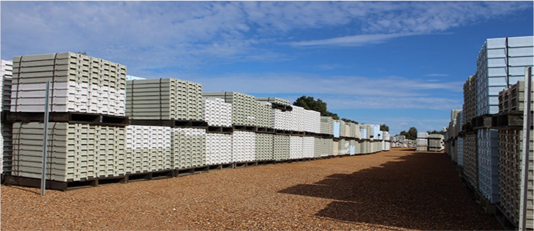 Stacked Discoverer® Core Trays under the heat of the sun